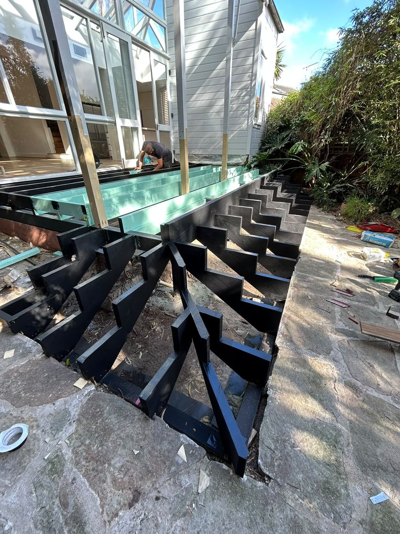 The new deck frame in place beside the conservatory, ready for boards