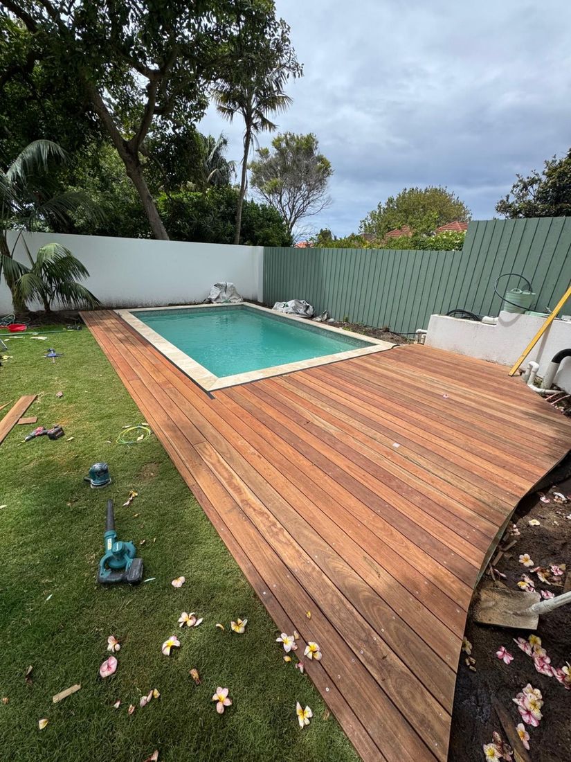 The completed timber deck running along the pool