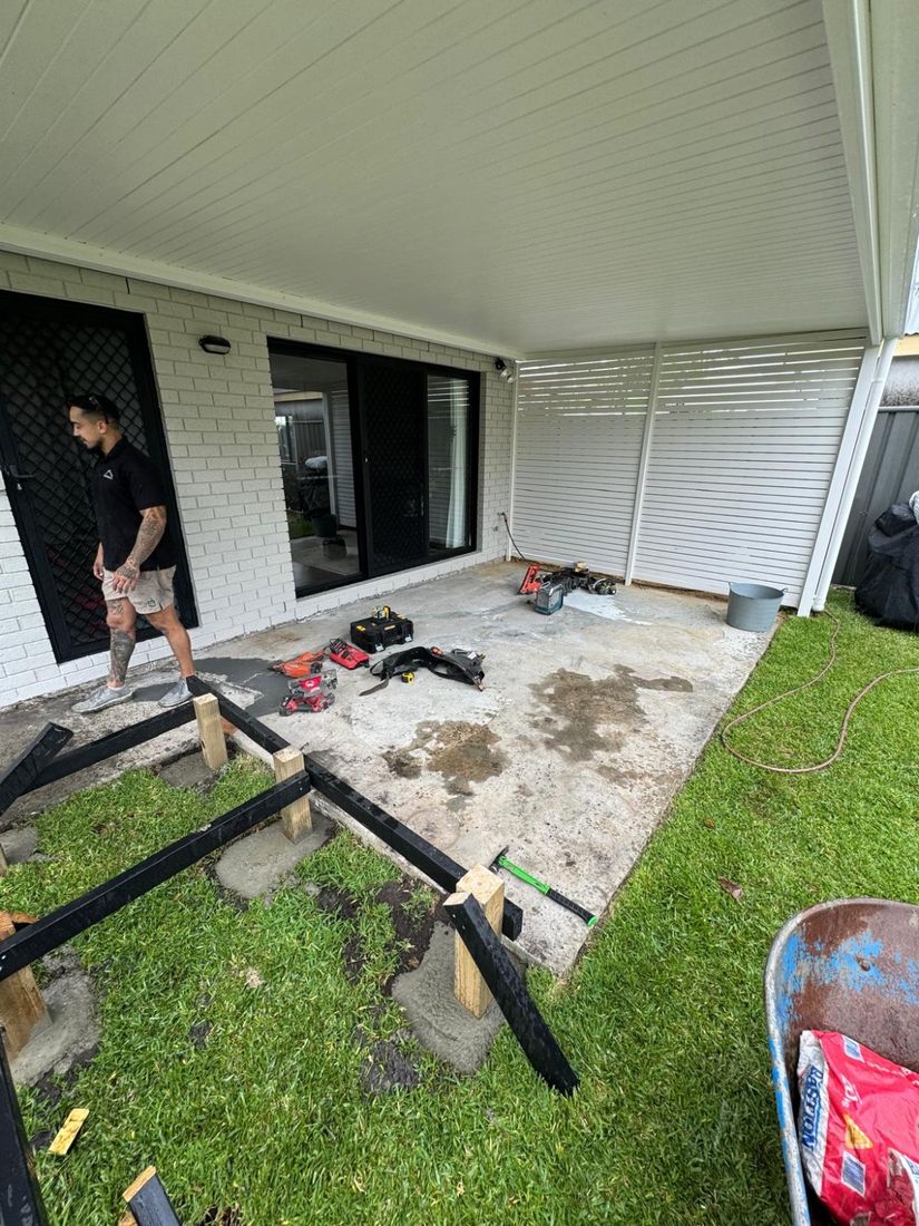 Posts in on the ground under the patio, ready for the frame