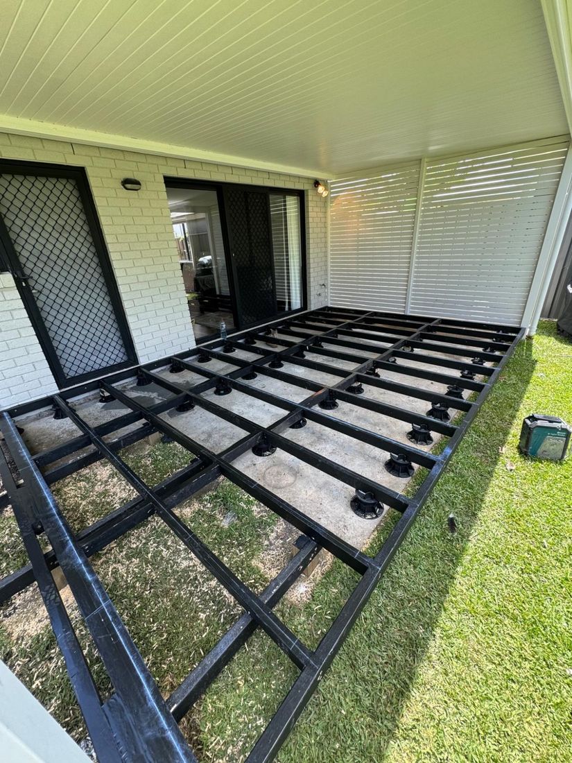 The deck frame in place under the patio